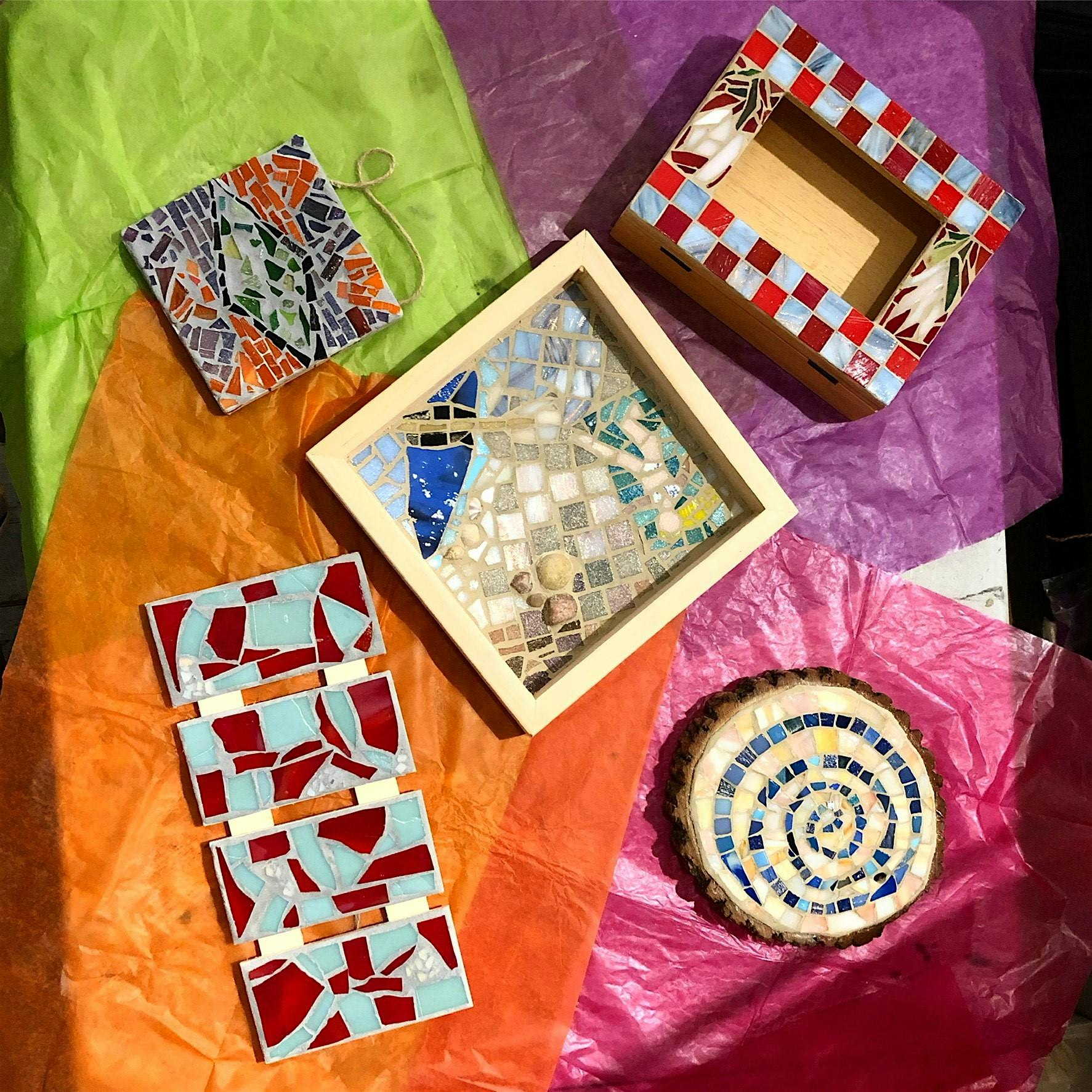 Colourful mosaic tiles arranged during the beginner mosaic workshop at At Origin Coffee, Toronto